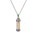 Macro detail of rainbow stainless steel perfume bottle pendant filled with yellow crystals - Citrine