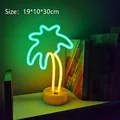 Coconut tree LED neon table light with yellow trunk and green leaves on a black base - Coconut Tree Dual Color With Base