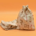 Beige cotton drawstring sachet bag featuring cute cat print and Beautiful Day text - Cat