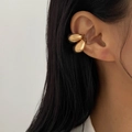 Macro shot of gold double teardrop ear cuff with minimalist multilayer hollow design - Gold (6459)