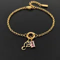 Premium 14K gold plated stainless steel bracelet with pink zircon and heart pendant - Letter E