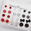 12-pair earring set featuring rose motifs, heart shapes, and pearls on a display card - Red Black White Silver Floral Heart Set (ER21Y0531-4)