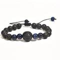 Detail of adjustable woven lava stone bracelet with blue accent beads on white background - 05-Blue Glossy Beads