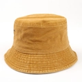Detail shot of a ginger yellow washed cotton bucket hat with six-row reinforced stitching - M (56-58cm) / Turmeric