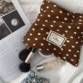 Detail of pleated brown polka dot cosmetic bag with Pleasant Time fabric label - Coffee Polka Dot Makeup Bag