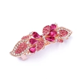 Detailed macro view of rose gold floral hair clip with vibrant pink teardrop gemstones - Style D / Pink