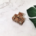 Detail of square acetate hair claw clip featuring brown and beige marble patterns - Coffee Floral (Small)