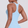 Close-up of racerback design on light blue brushed sports tank top with slim fit - Sky Blue