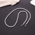 Close-up of white handmade pearl strap with silver lobster clasps on a grey background - 10mm Pearl Silver Lobster Clasp Style (K937)