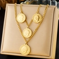 Gold layered double chain necklace with vintage coin pendants on jewelry display pillow - Gold Coin Style (N3336)