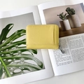 Yellow pebbled leather accordion wallet with zip closure and minimalist design - Goose Yellow