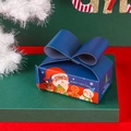Scatola regalo di Natale triangolare blu con motivi festivi e fiocco in nastro - Fiocco Blu / Babbo Natale Blu