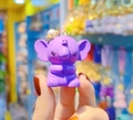 Purple resin flying elephant keychain with mini golden crown and pearl detail - Single Doll / Purple