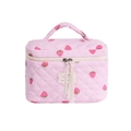 Pink quilted cosmetics bag with strawberry pattern featuring a top handle and ribbon - Pink Strawberry Barrel Bag