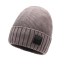 Dusty rose knitted ski beanie with mountain leather patch for winter warmth - One Size / Light Beige