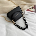 Mini black jelly bag with gold metal and acrylic chains and sleek leather finish - Black