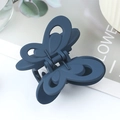 Elegant large navy blue butterfly hair claw clip with a matte finish and hollowed wing design - Rubber Dark Blue