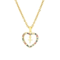 Détail d'un pendentif cœur doré avec zircons colorés et une petite croix centrale - Style Coeur avec Croix