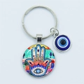 Hamsa Hand keychain with blue evil eye and colorful exotic tree pattern in metal finish - Exotic Hamsa Hand