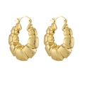 Detail of chunky gold hoop earrings with spiral textured finish and secure leverback closure - Gold Oval Bamboo