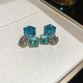Detail of 18k gold plated earrings featuring green and clear square zircon crystals - Geometric Spliced Blue and White Zirconia (3#)