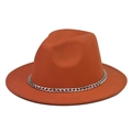 Detail of the thick orange wool fedora featuring a decorative bold silver metal chain - Orange Hat Silver Chain