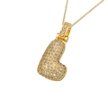 Golden cubic zirconia letter L pendant necklace with chunky iced-out bubble design - Gold L