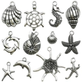 Collection of antique silver ocean theme alloy charms including starfish and seahorse - 12Pcs Antique Silver Ocean Life Series