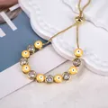 Verstellbares goldenes Evil Eye Armband mit gelber Emaille und Zirkonia Steinen - Gelb