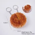 Realistic PVC mooncake keychain set with egg yolk and lotus seed paste texture detail - Pair of Egg Yolk & Lotus Seed Mooncakes (2 Halves) - With Keychain