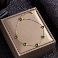 Golden stainless steel bracelet with five green heart-shaped zircons and adjustable chain - Gold/Green