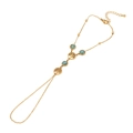 Böhmisches Gold-Fingerarmband mit Lebensbaum und Türkisperlen auf weißem Grund - Lebensbaum Türkis Stil (2#)