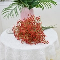 Artificial Gypsophila bouquet with vibrant red flowers and green stems on lace cloth - Red