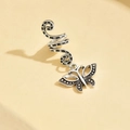 Macro shot of silver alloy butterfly pendant and spiral textured hair ring decoration - Vintage Textured Butterfly Style (6#)