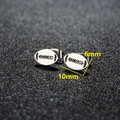 Mini silver rugby ball stud earrings in stainless steel with detailed sports design - Rugby Ball / Steel