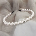 Elegant headband with white pearls and metal frame featuring black protective fabric tips - 17# Cross Large Pearl Headband