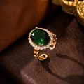Macro detail of vintage emerald zirconia ring with gold chain band and crystal halo - 10432-Emerald Ring