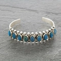 Bohemian silver cuff bracelet featuring 11 marquise turquoise stones in Navajo style - 11 Marquise Blue Turquoise