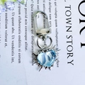 Chic keychain with light blue heart crystal and silver metal spiked frame pendant - Blue Thorny Barbed Heart
