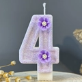 Sparkly purple number 4 birthday candle with small floral accents for cake topper decoration - Number 4