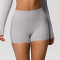 Dettaglio dei pantaloncini a compressione senza cuciture a vita alta in tessuto grigio - S / Grigio Ghiaccio