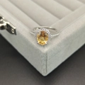 925 sterling silver ring featuring an oval yellow gemstone in a classic halo setting - Size 5 / Citrine