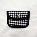 Minimalist houndstooth coin purse featuring black and white tweed fabric and metal snap - Houndstooth