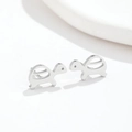 Minimalist silver sea turtle stud earrings featuring a polished metallic finish for women - Steel