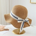 Detail of wide brim straw sun hat featuring a striped blue and white lace ribbon bow - M (56-58cm) / Khaki