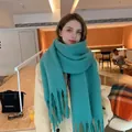 Thick cyan faux cashmere knitted scarf with tassel details and plush texture for winter - Deep Sea Green