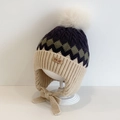 Kids' winter knit trapper hat in beige and green rhombus pattern with a white pompom - Rhombus Twist / Navy Beige