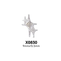 Macro view of silver punk star nail charm with center gemstone, size 9mm x 15.5mm - X830-Silver Cross Star with White Zirconia