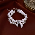 Detail of double-layer pearl bracelet with white bow clasp and square crystal charm - Double Layer Pearl Bracelet - Bowknot Style (WB1584)