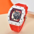 Detailed macro view of white tonneau case and intricate skeleton dial of mechanical watch - Skeleton Tonneau / White Case Red Strap